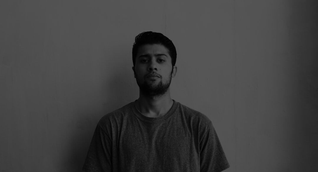 Studio portrait of a young man with a beard